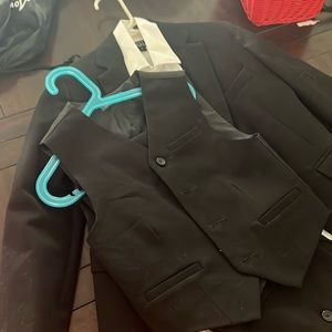 Boys black suit with vest and shirt.